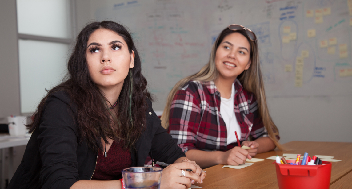 Two Indigenous people having a consultation