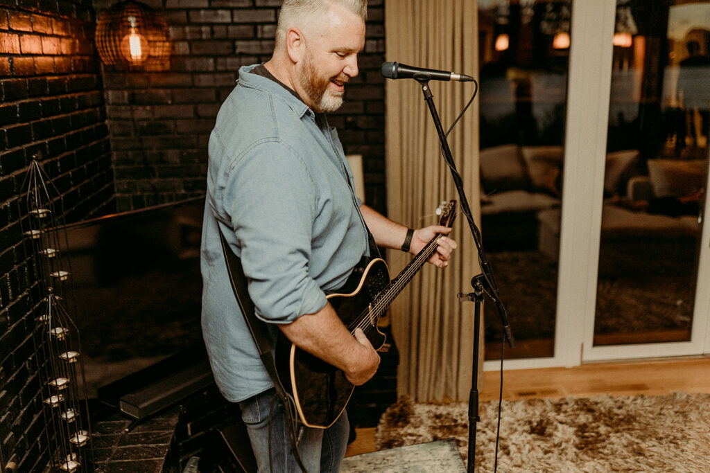 man playing guitar